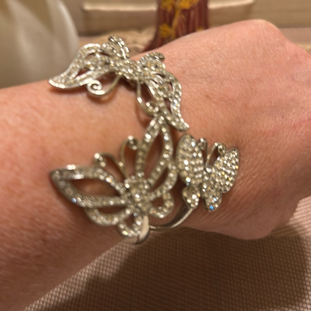 Butterfly trio white crystal and silver tone hinged bracelet